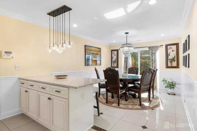 55 Nottingham Dr, Old Bridge, NJ 08857 - dining area with wainscoting, light tile patterned flooring, ornamental molding, a chandelier, and recessed lighting