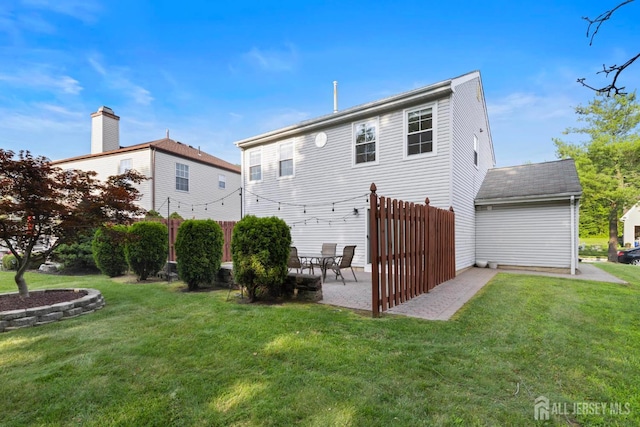 55 Nottingham Dr, Old Bridge, NJ 08857 - back of property with a patio area and a yard
