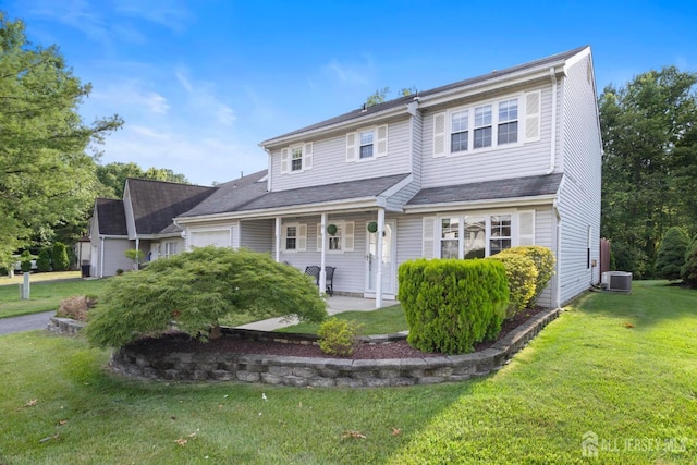 55 Nottingham Dr, Old Bridge, NJ 08857 - view of front of home featuring a front yard and a garage