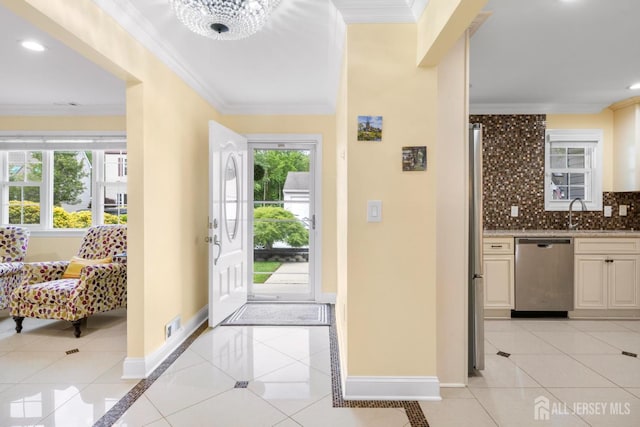55 Nottingham Dr, Old Bridge, NJ 08857 - entrance foyer featuring light tile patterned flooring, crown molding, and recessed lighting