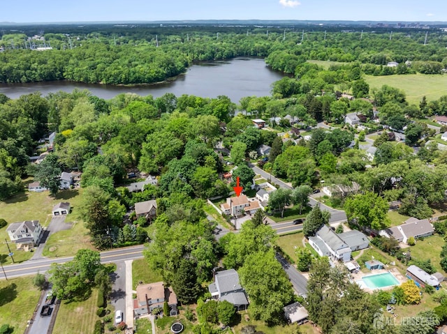 299 Riva Ave, East Brunswick, NJ 08850 - aerial view of property's location featuring a nearby body of water, a heavily wooded area, and nearby suburban area