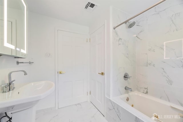 299 Riva Ave, East Brunswick, NJ 08850 - full bathroom with marble look tiles, a sink, and tub / shower combination