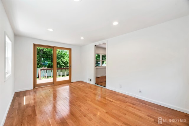 299 Riva Ave, East Brunswick, NJ 08850 - unfurnished room featuring light wood finished floors, baseboards, and recessed lighting