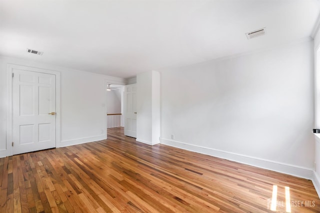 299 Riva Ave, East Brunswick, NJ 08850 - unfurnished room with hardwood / wood-style floors and baseboards