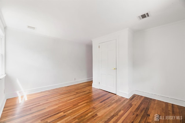 299 Riva Ave, East Brunswick, NJ 08850 - unfurnished room featuring ornamental molding, wood-type flooring, and baseboards