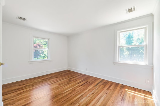 299 Riva Ave, East Brunswick, NJ 08850 - empty room featuring baseboards, ornamental molding, and light wood-style floors