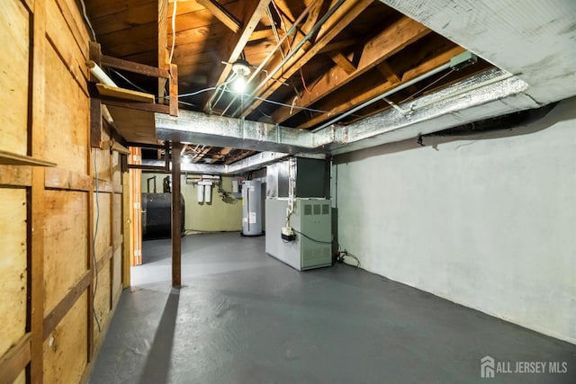 299 Riva Ave, East Brunswick, NJ 08850 - unfinished basement with gas water heater, heating fuel, and heating unit