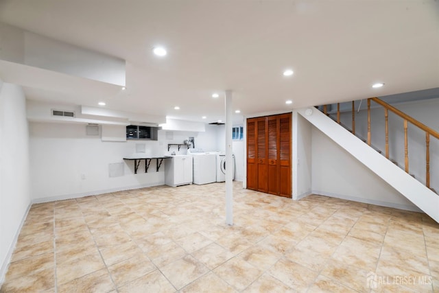 299 Riva Ave, East Brunswick, NJ 08850 - finished below grade area featuring washing machine and clothes dryer, recessed lighting, baseboards, and stairs