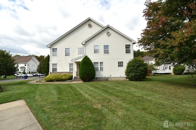 view of front of house with a front lawn