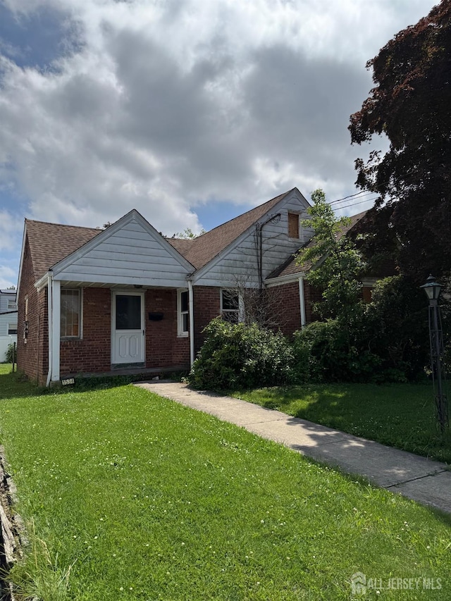 1534 Julian Ter, Union Twp, NJ 07083 - bungalow-style house featuring a front lawn, brick siding, and roof with shingles