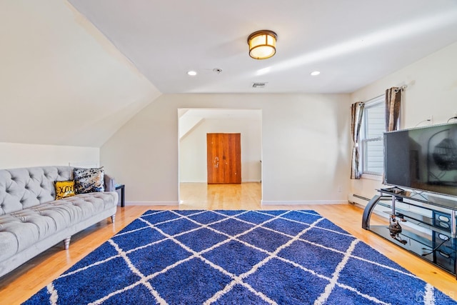 bedroom with visible vents, recessed lighting, and wood finished floors