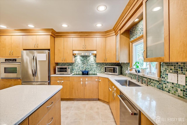 207 Dellwood Rd, Metuchen, NJ 08840 - kitchen with stainless steel appliances, a sink, light stone countertops, decorative backsplash, and recessed lighting