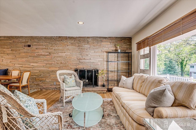 207 Dellwood Rd, Metuchen, NJ 08840 - living area featuring wood finished floors, recessed lighting, and a fireplace with raised hearth