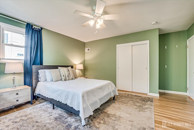 207 Dellwood Rd, Metuchen, NJ 08840 - bedroom featuring wood finished floors, a closet, baseboards, and a ceiling fan