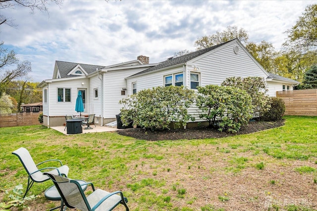 207 Dellwood Rd, Metuchen, NJ 08840 - rear view of house featuring a patio area and a chimney