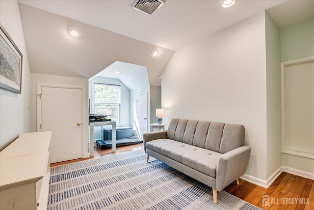 207 Dellwood Rd, Metuchen, NJ 08840 - sitting room featuring wood finished floors, lofted ceiling, recessed lighting, and baseboards