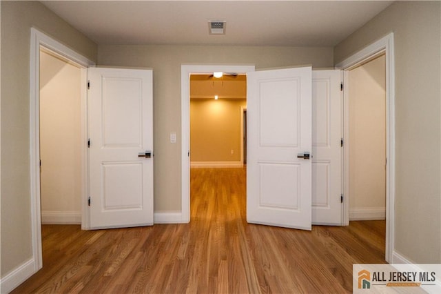 4 Kristina Ct, East Brunswick, NJ 08816 - unfurnished bedroom with wood finished floors and baseboards