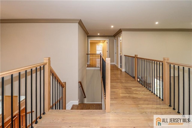 4 Kristina Ct, East Brunswick, NJ 08816 - hallway with an upstairs landing, ornamental molding, wood finished floors, recessed lighting, and baseboards