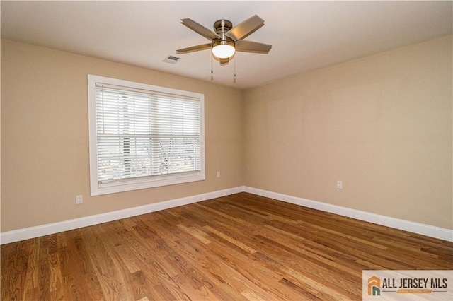 4 Kristina Ct, East Brunswick, NJ 08816 - spare room featuring baseboards, wood finished floors, and ceiling fan