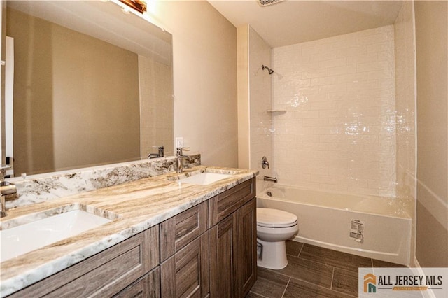 4 Kristina Ct, East Brunswick, NJ 08816 - bathroom featuring toilet, shower / bathtub combination, double vanity, and wood finish floors