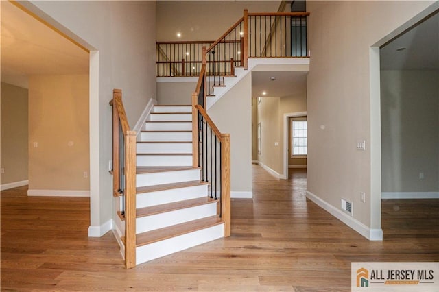 4 Kristina Ct, East Brunswick, NJ 08816 - stairs featuring wood finished floors and baseboards