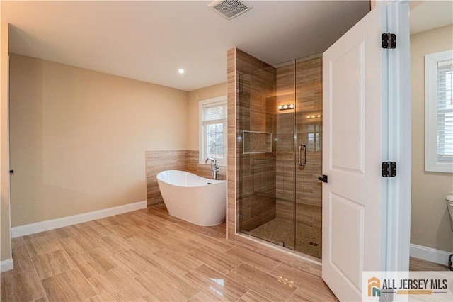 4 Kristina Ct, East Brunswick, NJ 08816 - full bath with a shower stall, a soaking tub, recessed lighting, and baseboards
