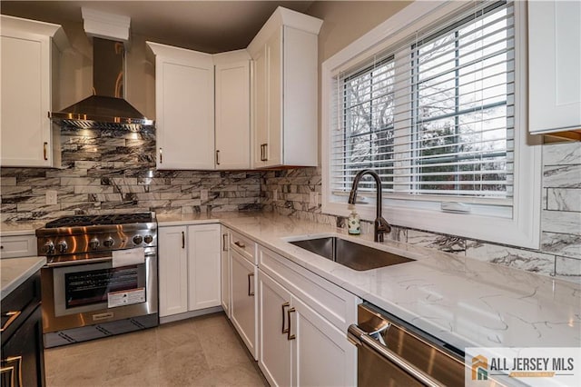 4 Kristina Ct, East Brunswick, NJ 08816 - kitchen with stainless steel appliances, wall chimney exhaust hood, a sink, and white cabinets