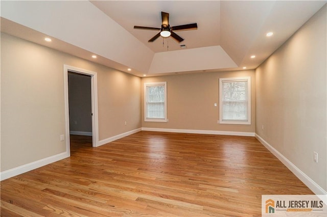 4 Kristina Ct, East Brunswick, NJ 08816 - empty room with ceiling fan, recessed lighting, a raised ceiling, light wood-style floors, and baseboards