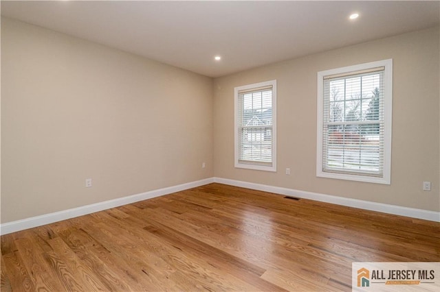 4 Kristina Ct, East Brunswick, NJ 08816 - unfurnished room with baseboards, recessed lighting, and light wood-style floors