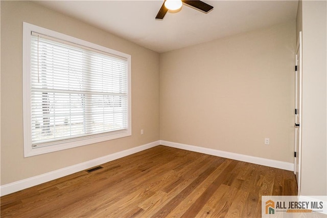 4 Kristina Ct, East Brunswick, NJ 08816 - unfurnished room featuring baseboards, ceiling fan, and wood finished floors