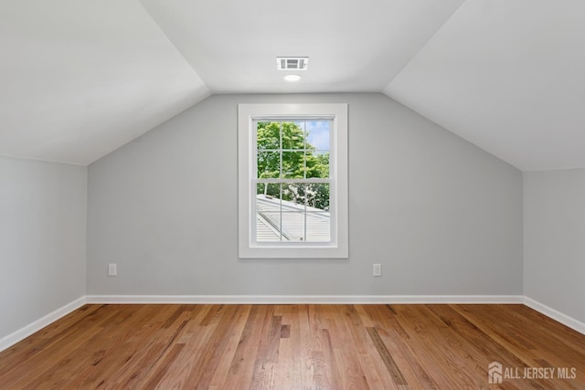 831 W Inman Ave, Rahway, NJ 07065 - bonus room with lofted ceiling, wood finished floors, and baseboards