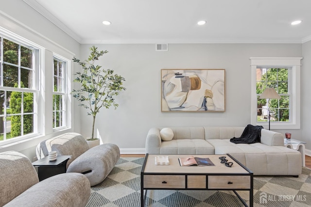 831 W Inman Ave, Rahway, NJ 07065 - living area featuring plenty of natural light, baseboards, recessed lighting, wood finished floors, and ornamental molding