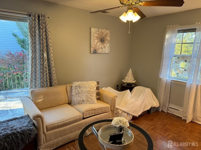 interior space featuring ceiling fan