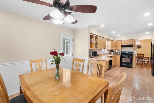 2001 Grant Ave, South Plainfield, NJ 07080 - dining area featuring recessed lighting, light tile patterned floors, a ceiling fan, and a wainscoted wall