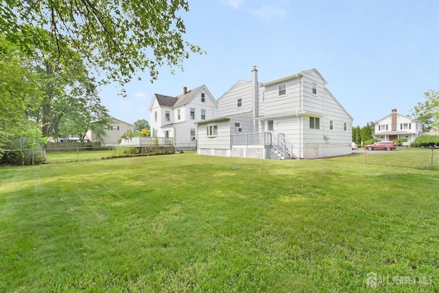 2001 Grant Ave, South Plainfield, NJ 07080 - rear view of house with a fenced backyard