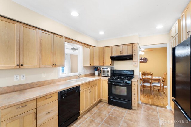 2001 Grant Ave, South Plainfield, NJ 07080 - kitchen with black appliances, light brown cabinetry, under cabinet range hood, a ceiling fan, and recessed lighting