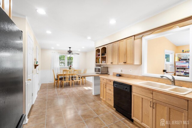 2001 Grant Ave, South Plainfield, NJ 07080 - kitchen featuring dishwasher, light brown cabinetry, freestanding refrigerator, stainless steel microwave, and light countertops