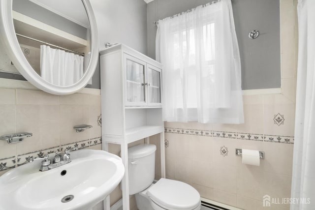 2001 Grant Ave, South Plainfield, NJ 07080 - bathroom with tile walls and a baseboard radiator
