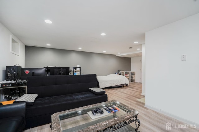 324 Oak Knoll Dr, Manalapan, NJ 07726 - living room featuring wood finished floors and recessed lighting