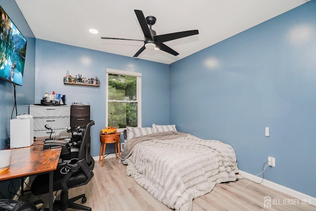 324 Oak Knoll Dr, Manalapan, NJ 07726 - bedroom featuring wood finished floors, an office area, and a ceiling fan