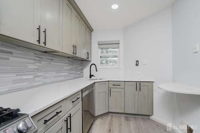 324 Oak Knoll Dr, Manalapan, NJ 07726 - kitchen with decorative backsplash, light wood-style flooring, gray cabinets, dishwasher, and light stone countertops