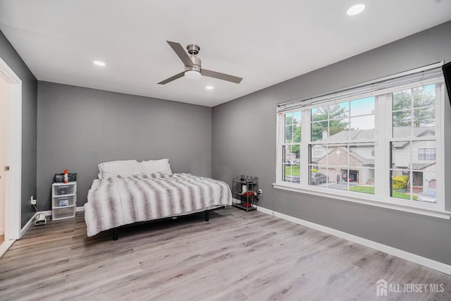 324 Oak Knoll Dr, Manalapan, NJ 07726 - bedroom with light wood finished floors, recessed lighting, and a ceiling fan