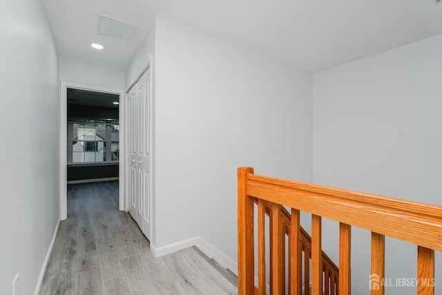 324 Oak Knoll Dr, Manalapan, NJ 07726 - hallway featuring an upstairs landing, wood finished floors, and recessed lighting