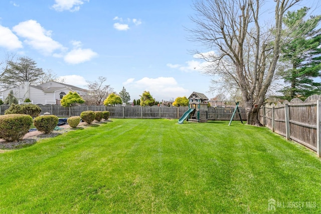 view of yard with a playground