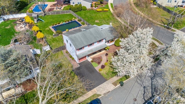 view of subject property featuring a pool