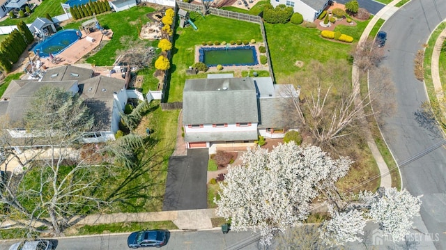 view of property location featuring nearby suburban area