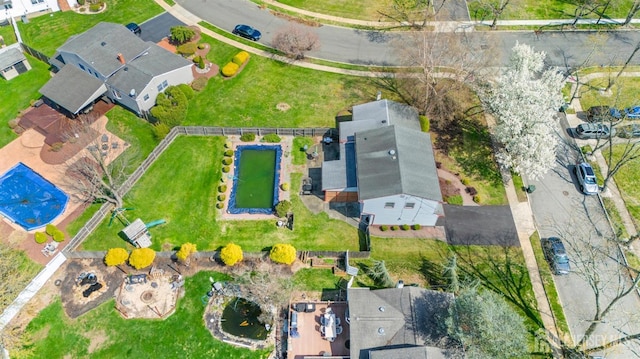aerial overview of property's location featuring nearby suburban area