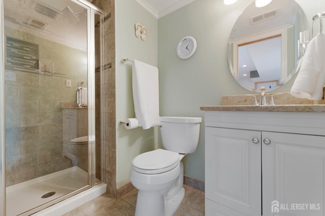 bathroom with toilet, crown molding, tile patterned floors, a stall shower, and vanity
