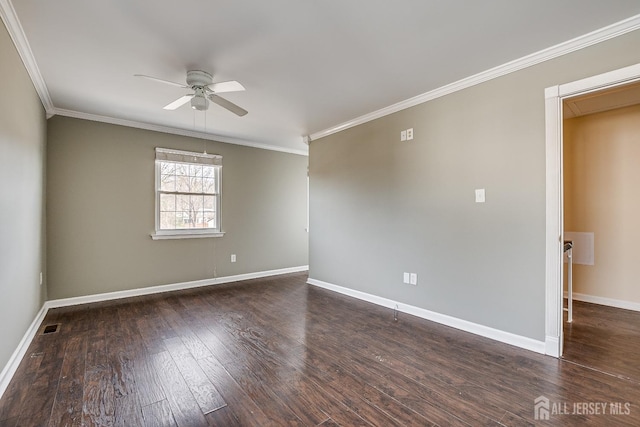 spare room featuring crown molding, dark hardwood / wood-style floors, and ceiling fan