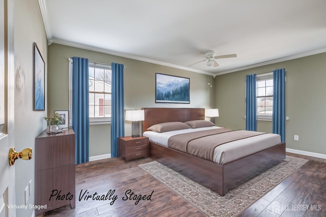 bedroom with crown molding, dark wood-type flooring, and ceiling fan